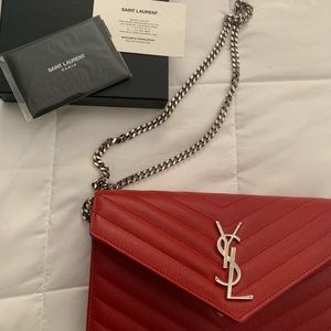 YSL CHAIN WALLET IN EMBOSSED LEATHER